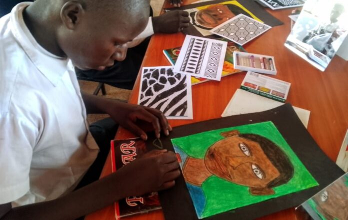 Fidel Odhiambo creating art